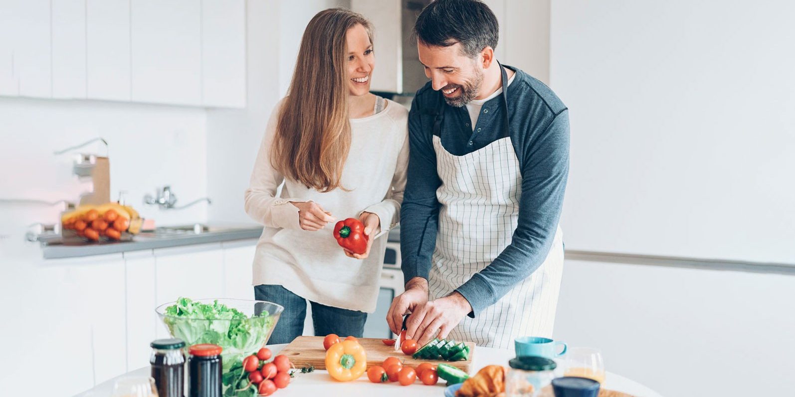 Couple preparing a ketogenic low carb meal at home