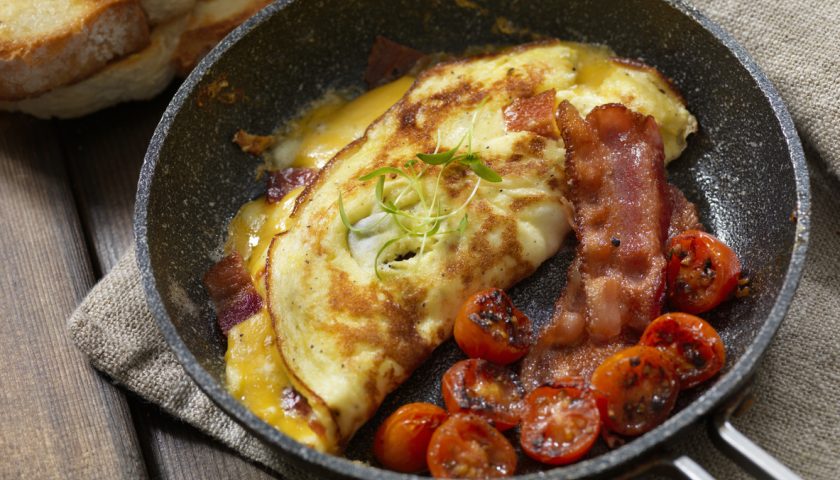 Omelette with bacon and tomatoes